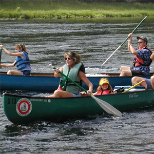 two groups in canoes on river Indian Head Canoeing Rafting Kayaking Tubing Delaware River