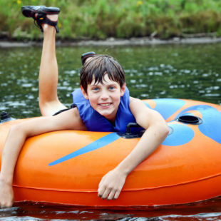 close up of young boy tubing Indian Head Canoeing Rafting Kayaking Tubing Delaware River