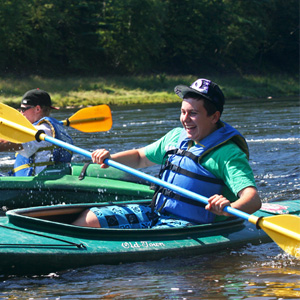 friendly race in kayak Indian Head Canoeing Rafting Kayaking Tubing Delaware River