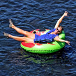 woman enjoying sun on her tube on the river Indian Head Canoeing Rafting Kayaking Tubing Delaware River